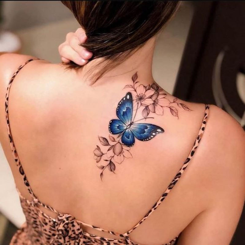 Tatuaje De Mariposa Con Diseño Floral: Ideas de tatuajes  